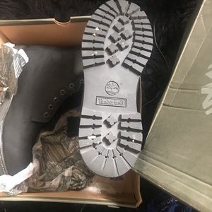 Men black timberland boots worn about 3 times look at the photos closely